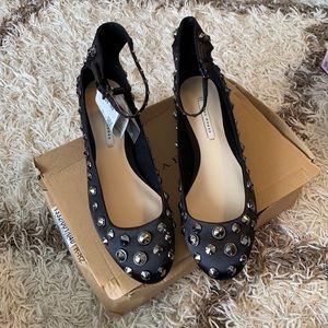Brand new in box black satin flats with studs.